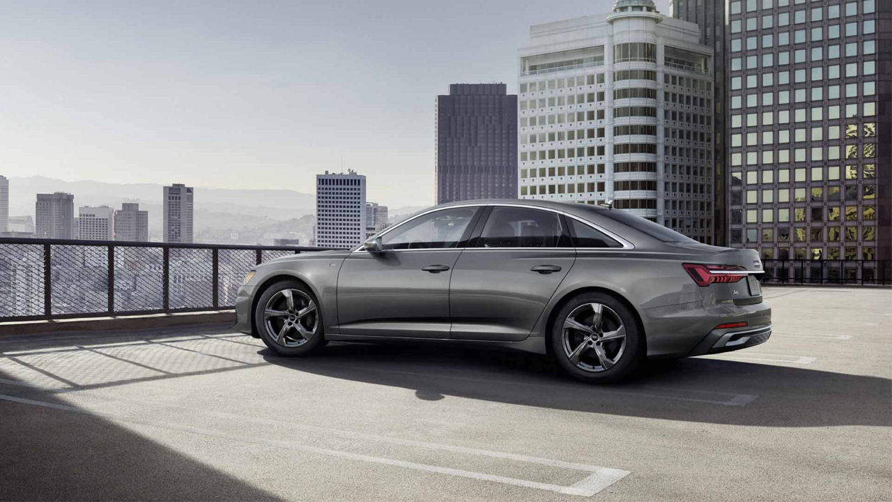 Side profile of an Audi A4 Sedan.