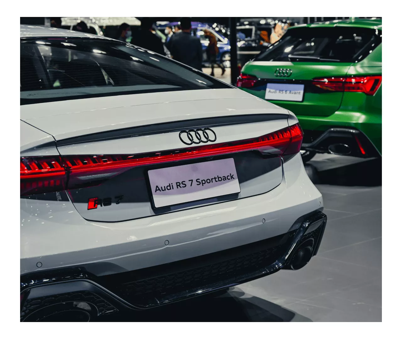 Three quarter view of an Audi q7 vehicle parked.