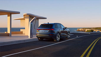 Back view of an Audi Q6 e-tron charging