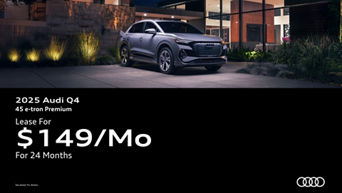 Three quarter view of an Audi Q4 parked.