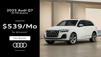 Three quarter view of an Audi Q7 parked.