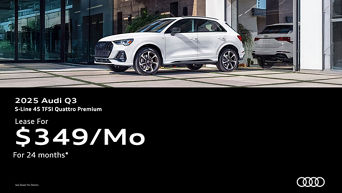 Three quarter view of an Audi Q3 parked.