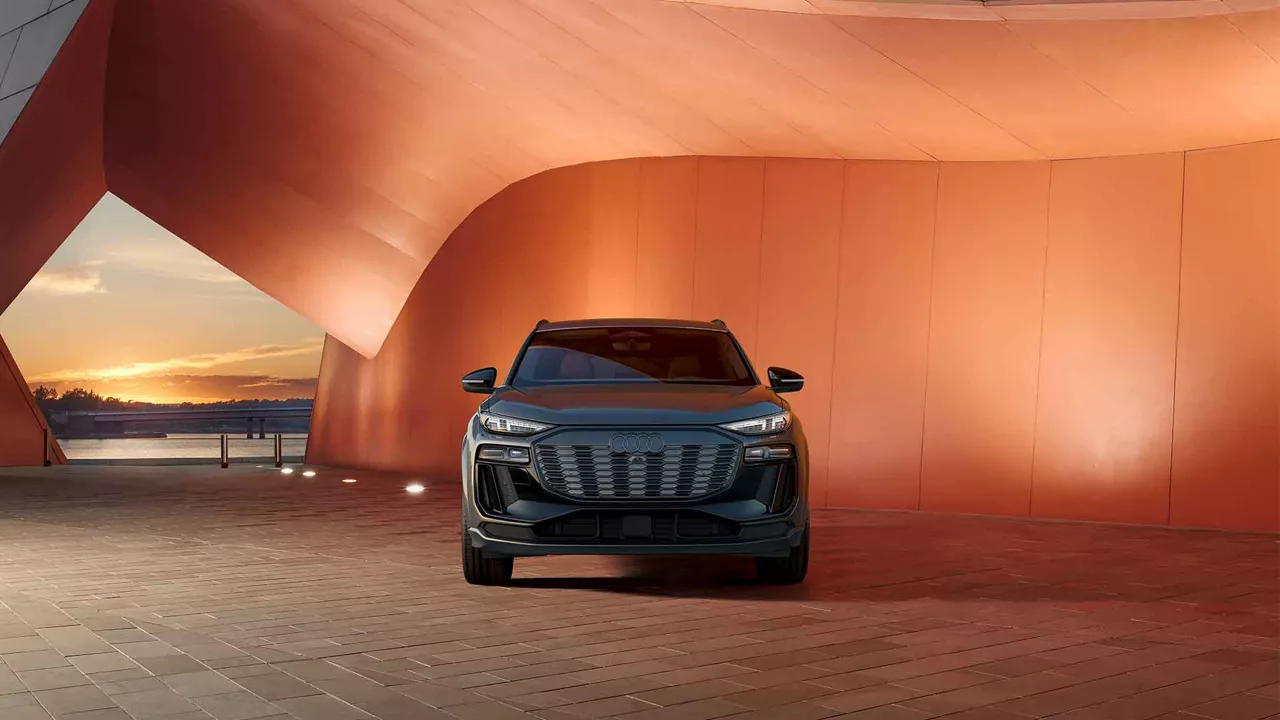 Front view of an Audi SQ6 e-tron parked.