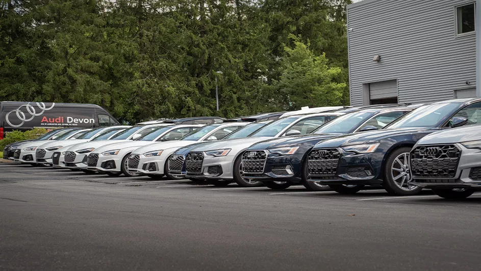 Three quarter view of an Audi q7 vehicle parked.
