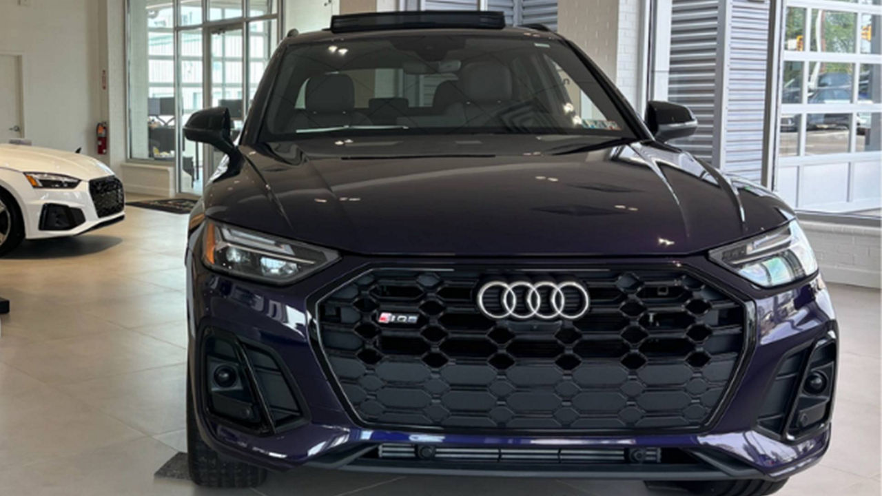 Front view of an Audi in the dealership showroom