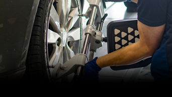 4 wheel Alignment - $10.00 off