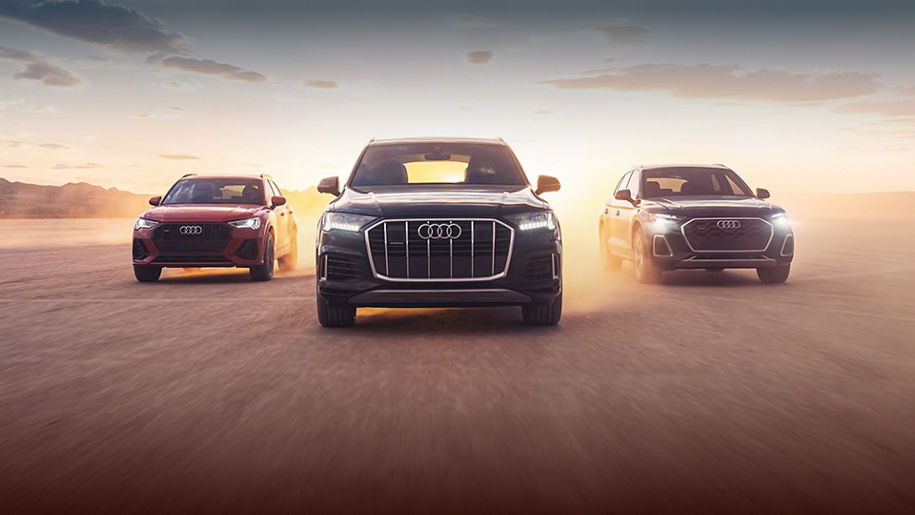 Right profile view of an Audi Q8 e-tron parked.