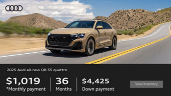 Side View of Audi Q8 Driving