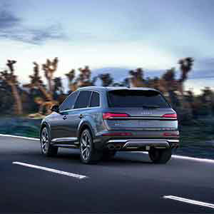 Back view of an Audi SQ7 accelerating.