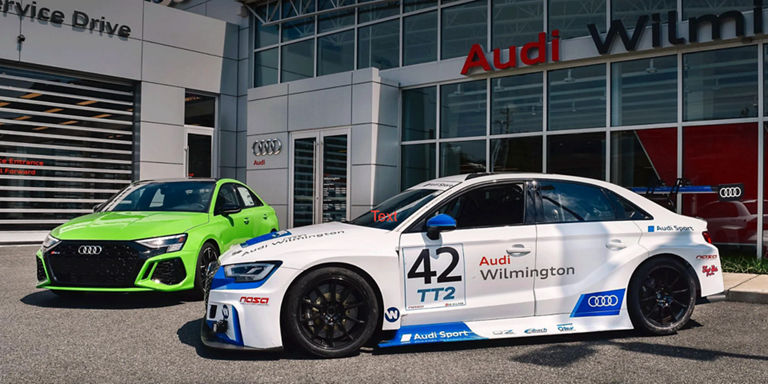 Audi Wilmington Track Days vehicles in front of dealership