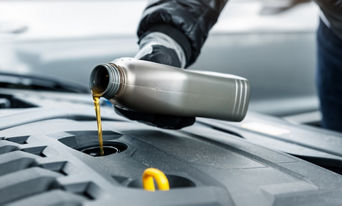 Service technician servicing tire.