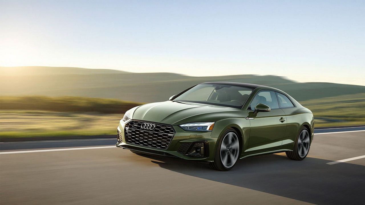 Audi A5 Sedan Driving accross the road