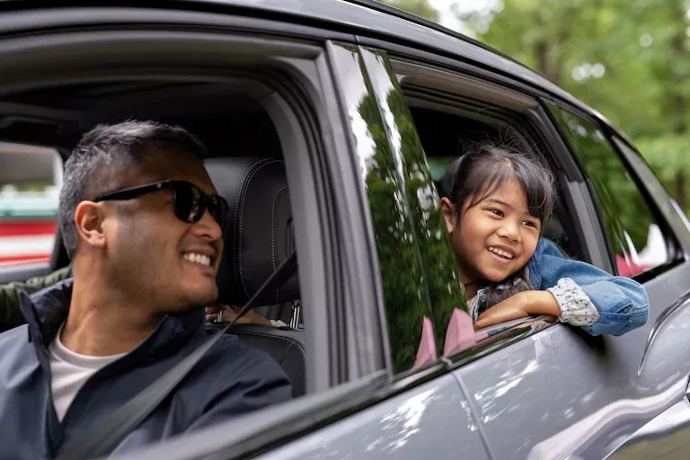 Family going on a trip in Audi Car