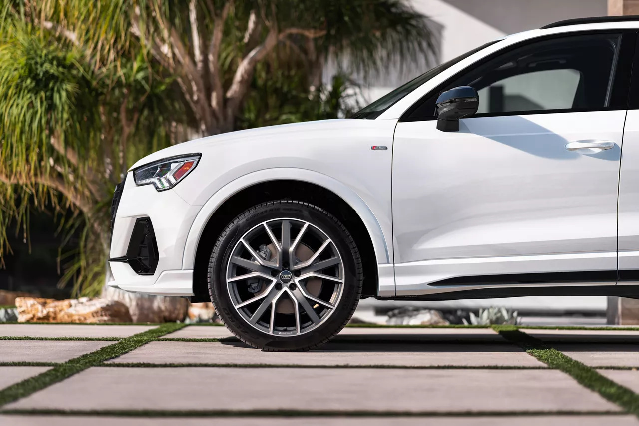 Audi Q3 front half left side profile