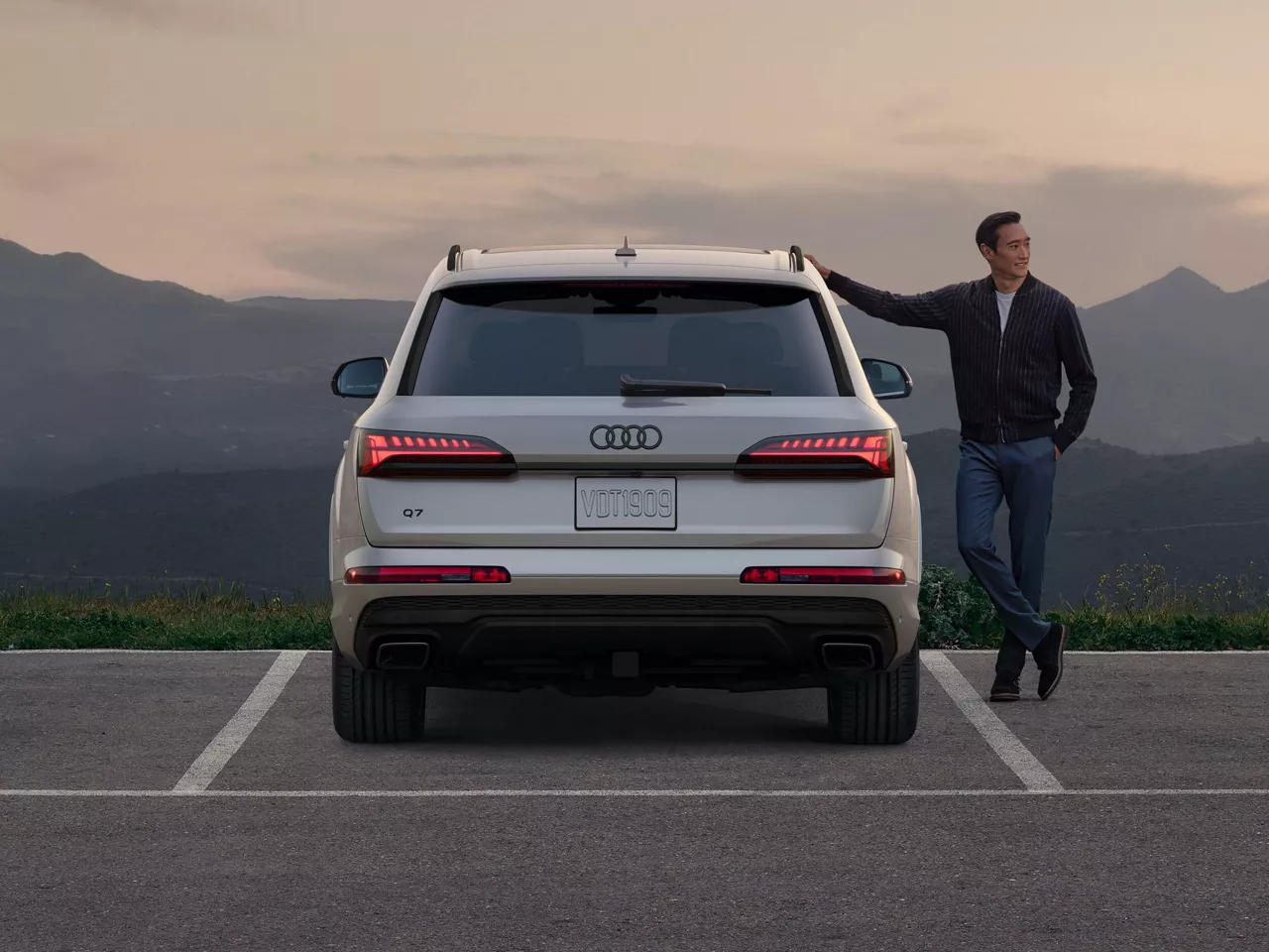 Rear View of New 2025 Audi Q7 with Owner