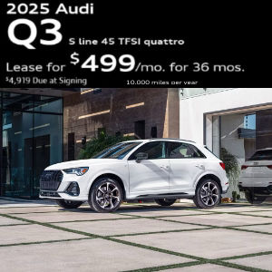 Side view of an Audi Q3 parked.