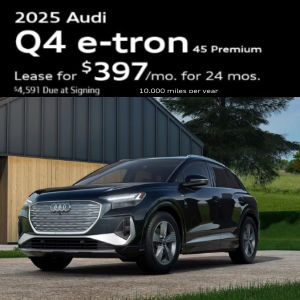 Side view of an Audi Q4 e-tron parked.