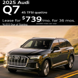 Side view of an Audi Q7 driving