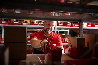 Car Battery held by Audi Technician
