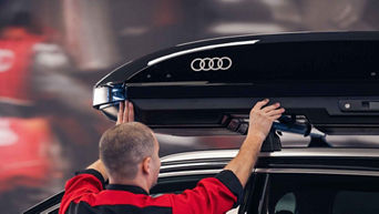 Service technician servicing vehicle