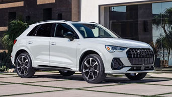 Front side view of 2025 Audi Q3 parked.