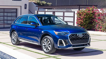 Front side view of an Audi Q5 parked.