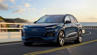 Front view of an Audi Q6 driving