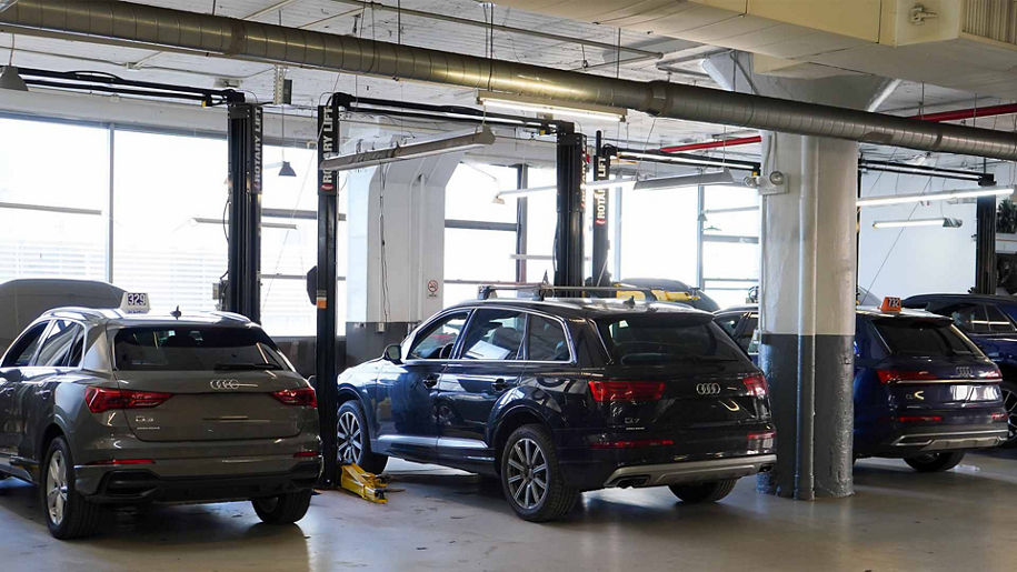 View of an Audi vehicle being serviced.