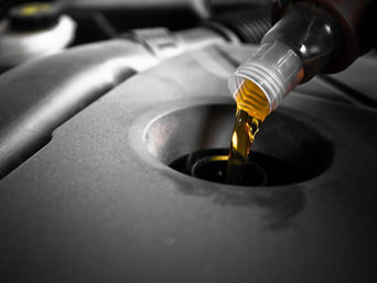 Vehicle oil being filled. 