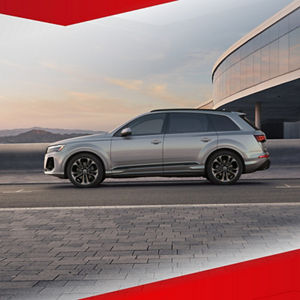 Back view of an Audi SQ7 accelerating.