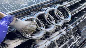 Audi rings being washed.
