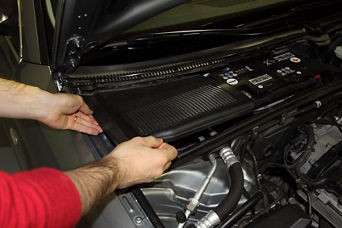 Service technician changing filter.