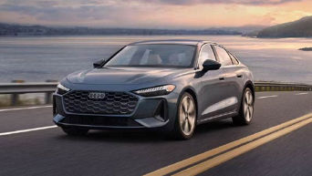 Three quarter profile view of an Audi All-new A5 parked.