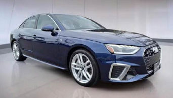 Three quarter profile view of an Audi A4 Sedan Premium Plus 45 TFSI® quattro® S tronic®.