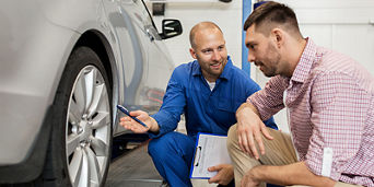 Technician talking to a customer.