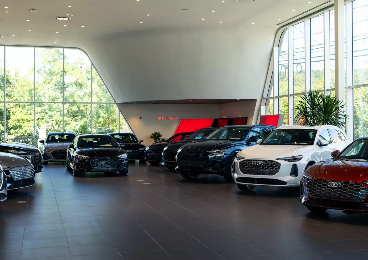 Audi employee polishing an Audi SUV