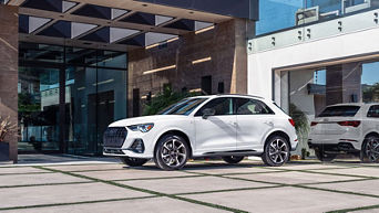 Side view of a 2025 Audi Q3 parked.