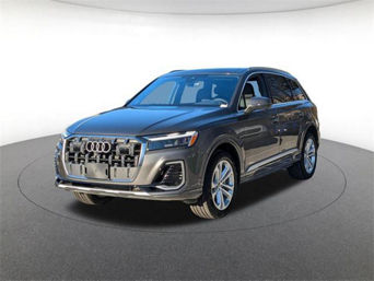 Side profile of an Audi Q7 parked.