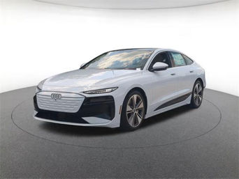Three-quarter view of an Audi A5 Premium parked.