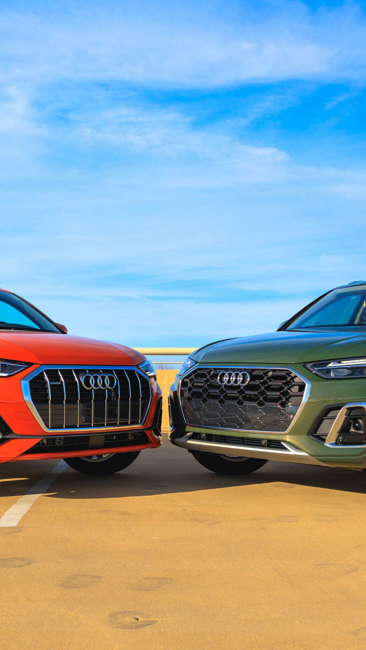 Front view of Audi vehicles parked.
