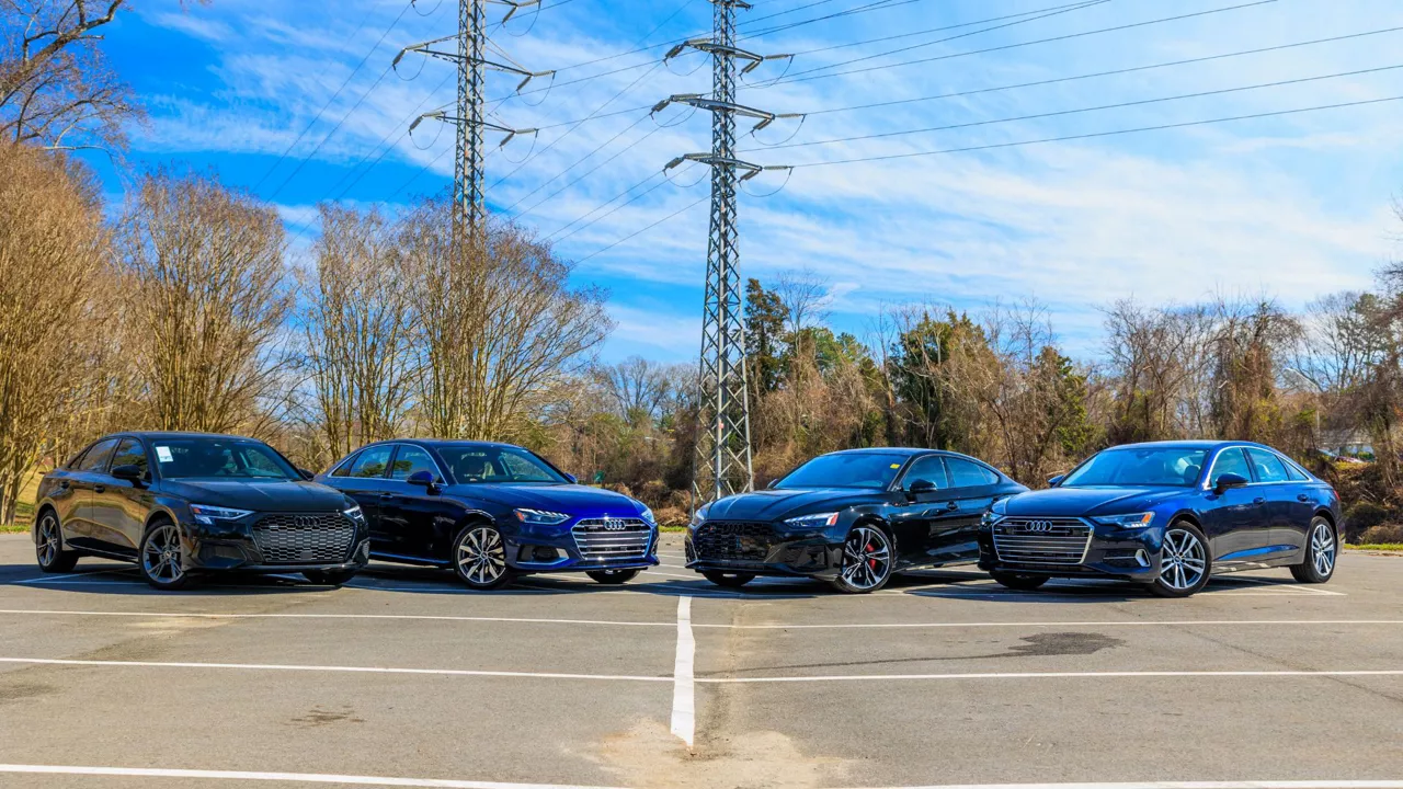 Front view of Audi vehicles parked.
