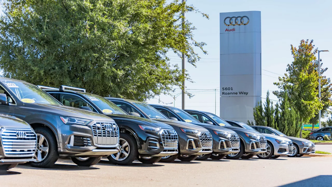 Audi vehicles parked.