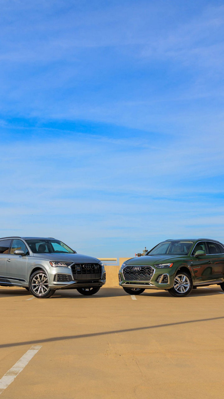 Front view of four Audi models parked.