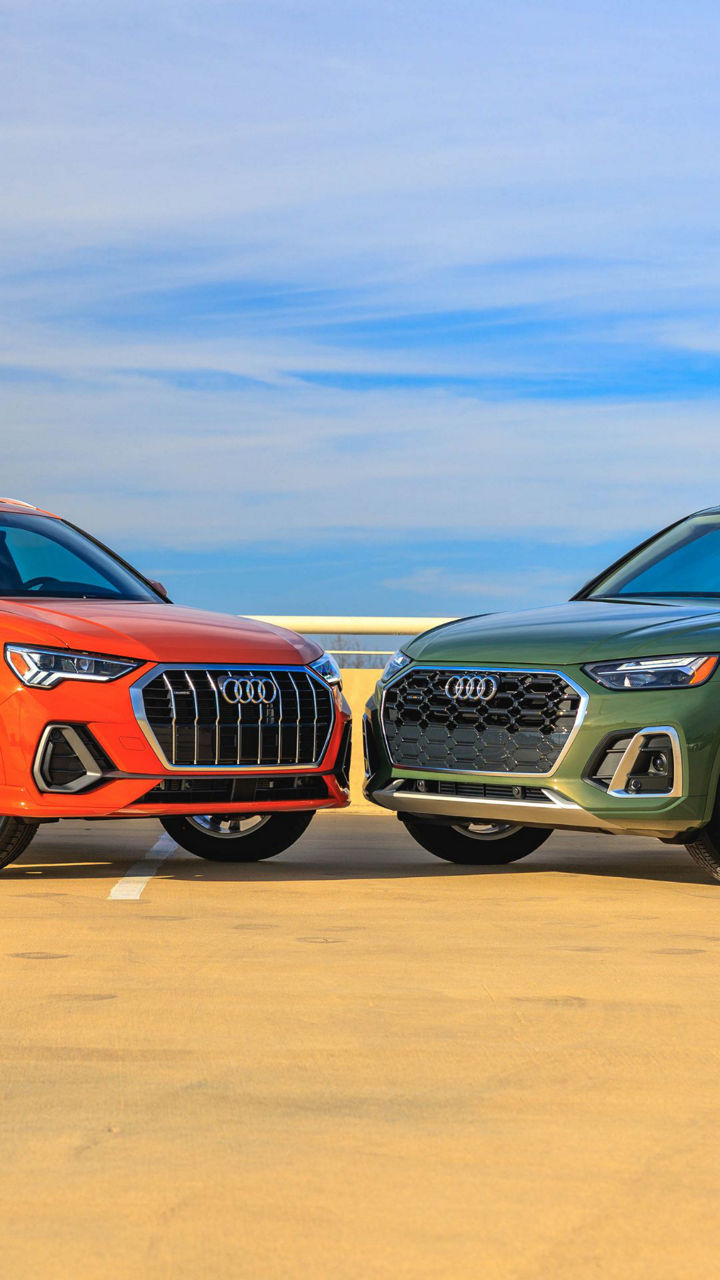 Three quarter view of an Audi parked.