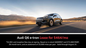 2025 Q6 e-tron driving on back road out West