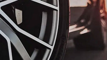 Close-up of a tire that is turned.