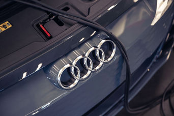 Close up of the Audi rings on the back of an Audi vehicle.