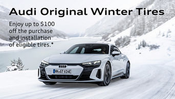 e-tron GT on a snowy mountain road