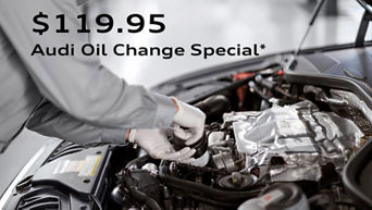 Service technician installing an oil filter