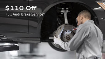Audi Technician Performing Brake Service*